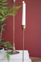 SET OF TWO TALL ANTIQUE BRASS TAPER CANDLE HOLDERS: Gold / Metal / Large: 3.5"d x 16"t;  
Small: 3.5"d x 12"t